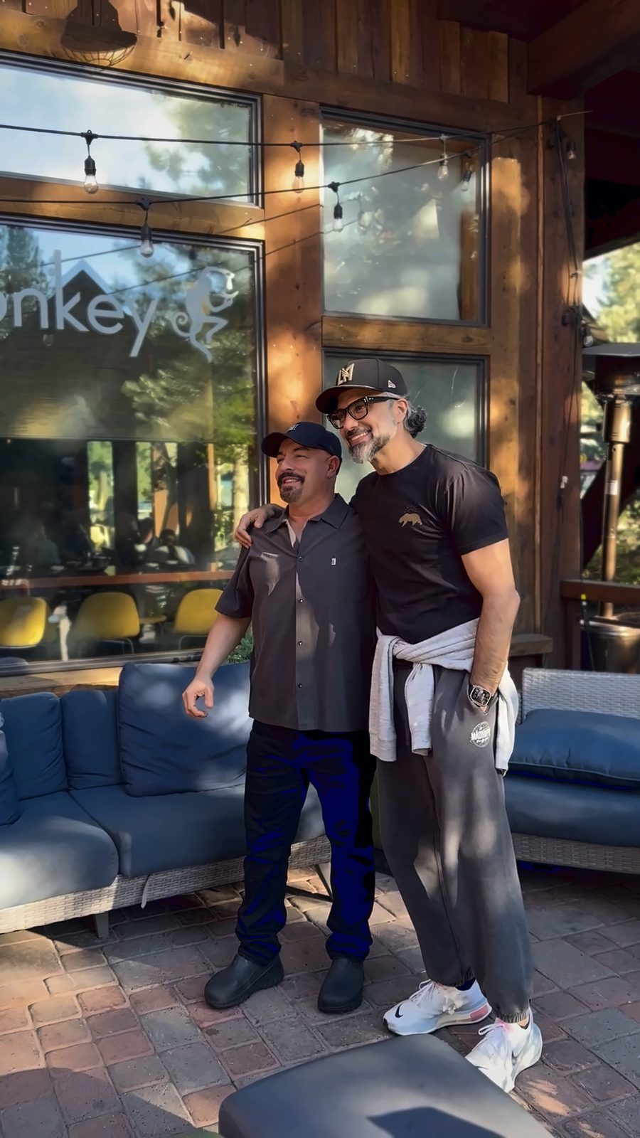 Jaime Camil, right, poses with a fan at golden hour on a Truckee restaurant patio